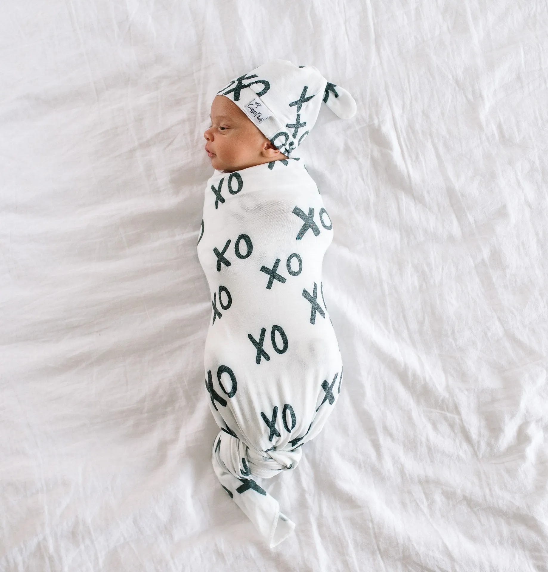 Copper Pearl XOXO Knit Swaddle Blanket