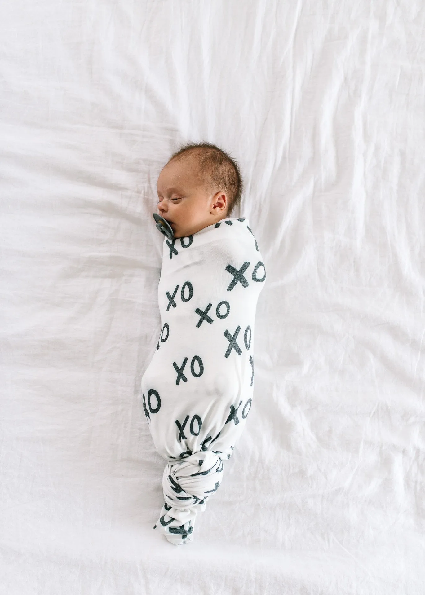 Copper Pearl XOXO Knit Swaddle Blanket